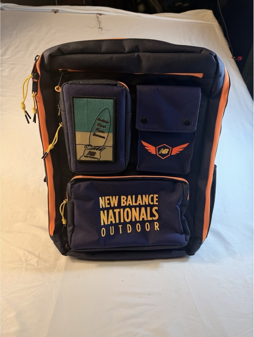 2022 New Balance Nationals backpack with New Balance Patch Purple Yellow Orange